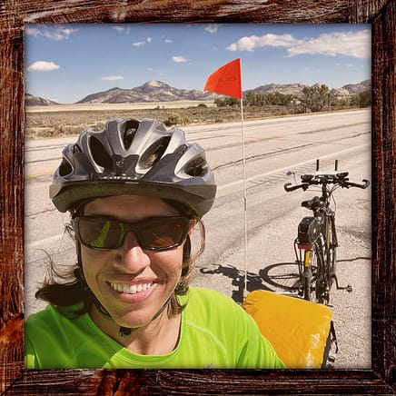 Photo, Day 25 of the TransAmerica Bicycle Trail, Mandy in front of Split Rock